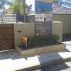 Stone Paving,Merbau Timber gate wth Stone block Garden bed